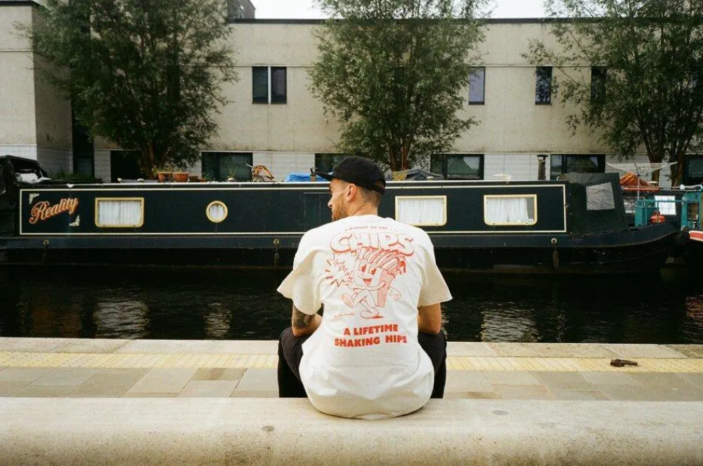 Pomme Frite x UN:IK 'Mr Chips' Tee - Natural